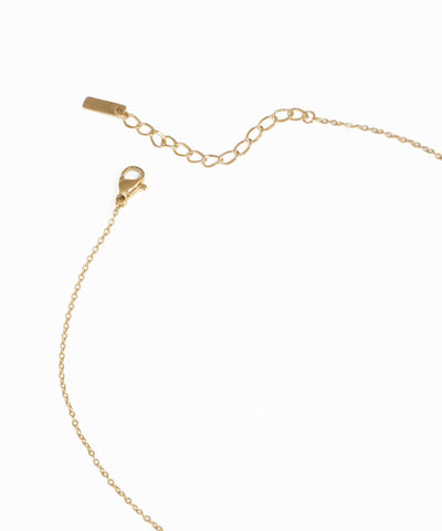 Gold pearl pendant necklace with sparkling crystal accent