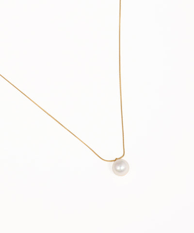 Fine chain necklace with lustrous round pearl drop pendant in gold finish
