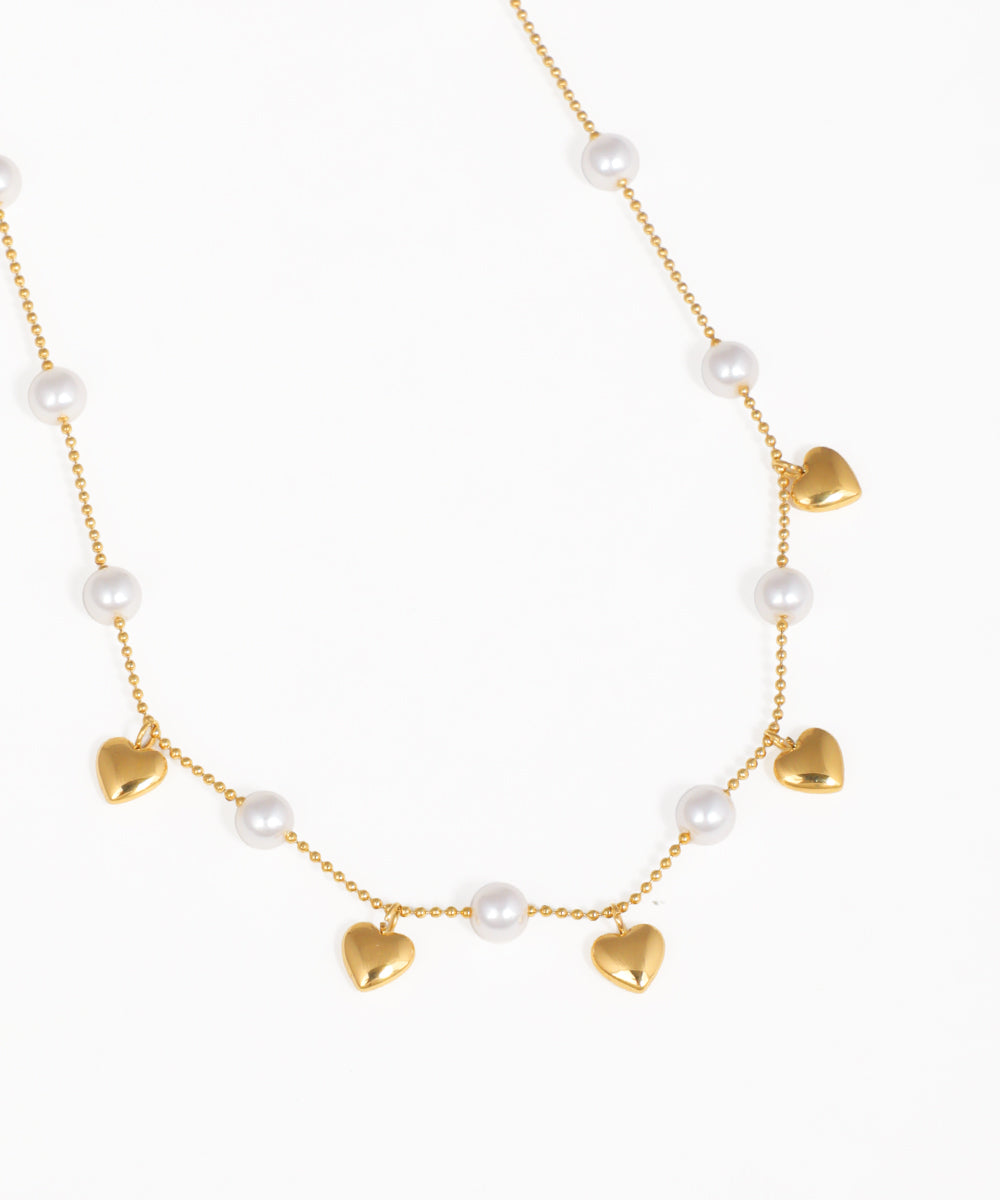 Petite beaded chain necklace with delicate crystal dangles and gold-tone finish