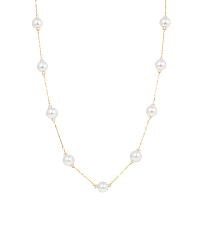 Delicate gold link chain necklace with spaced bead accents