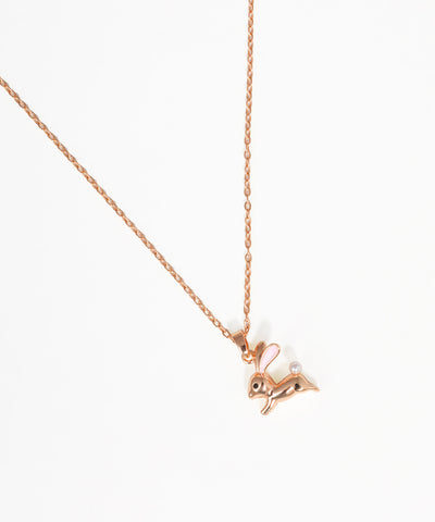 Minimalist gold necklace featuring a rabbit pendant