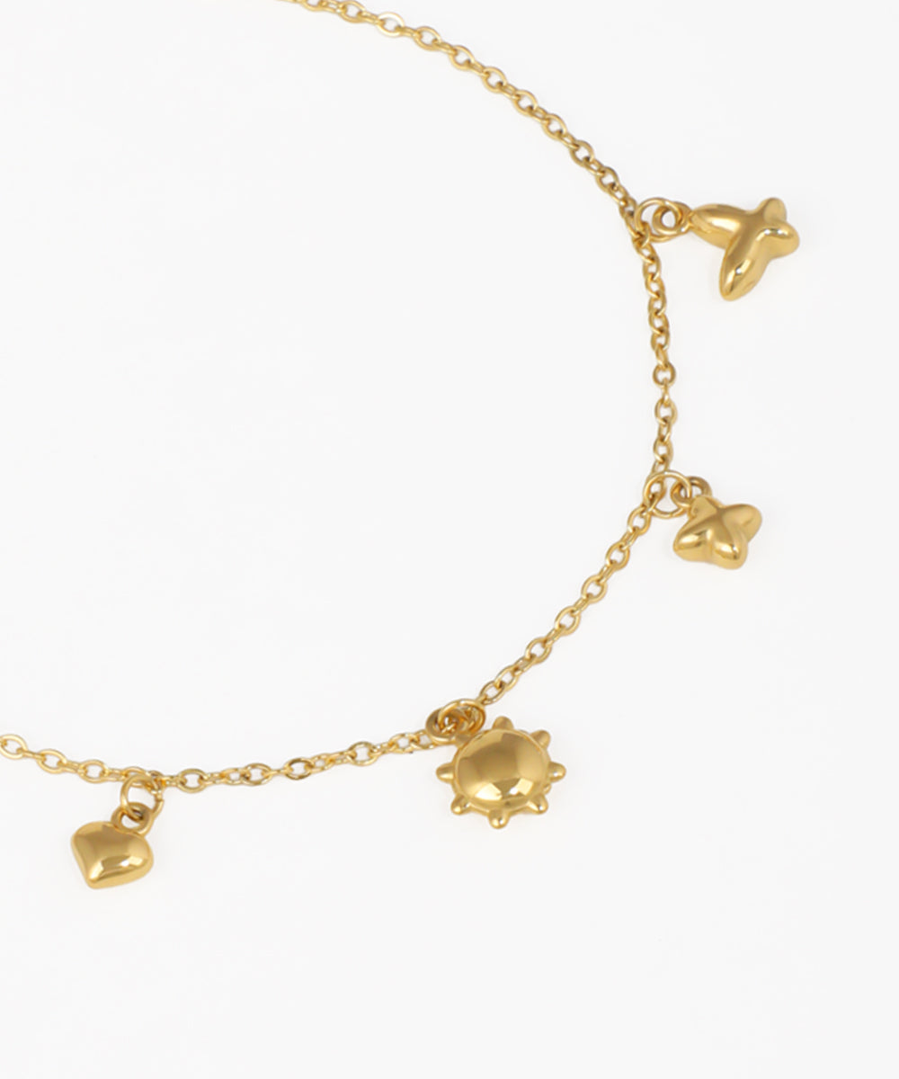 Delicate Charm Bracelet with Playful Motifs | Stylika