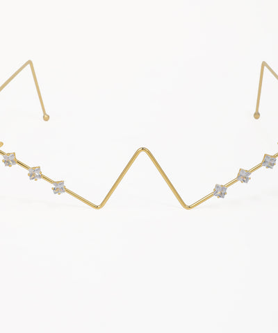 Fashion facelet with geometric gold lines, butterfly details, and crystal embellishments