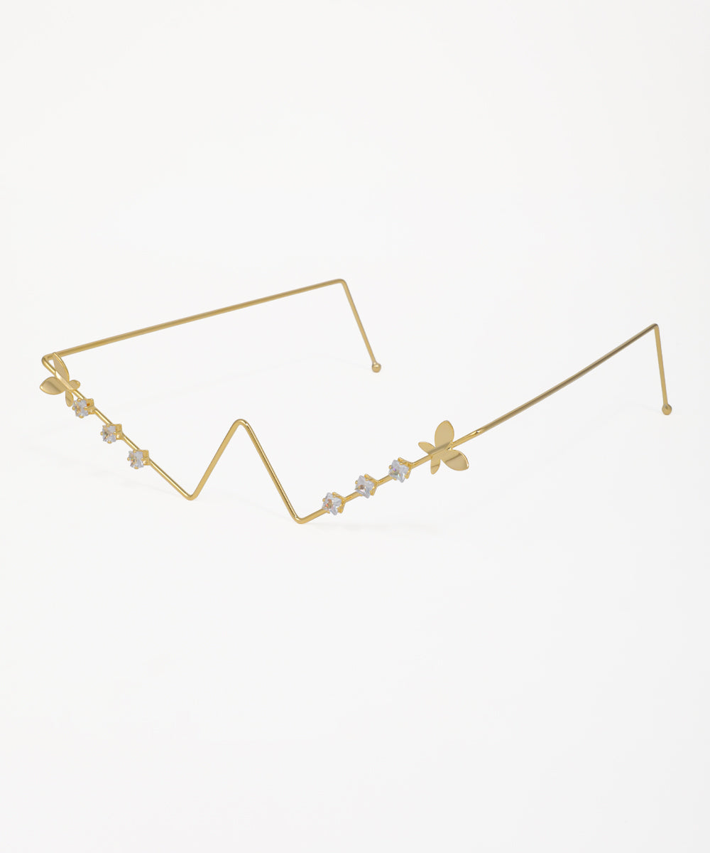 Contemporary gold facelet featuring butterfly motifs and sparkling stones