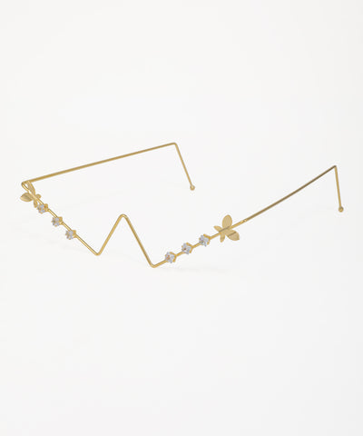 Contemporary gold facelet featuring butterfly motifs and sparkling stones