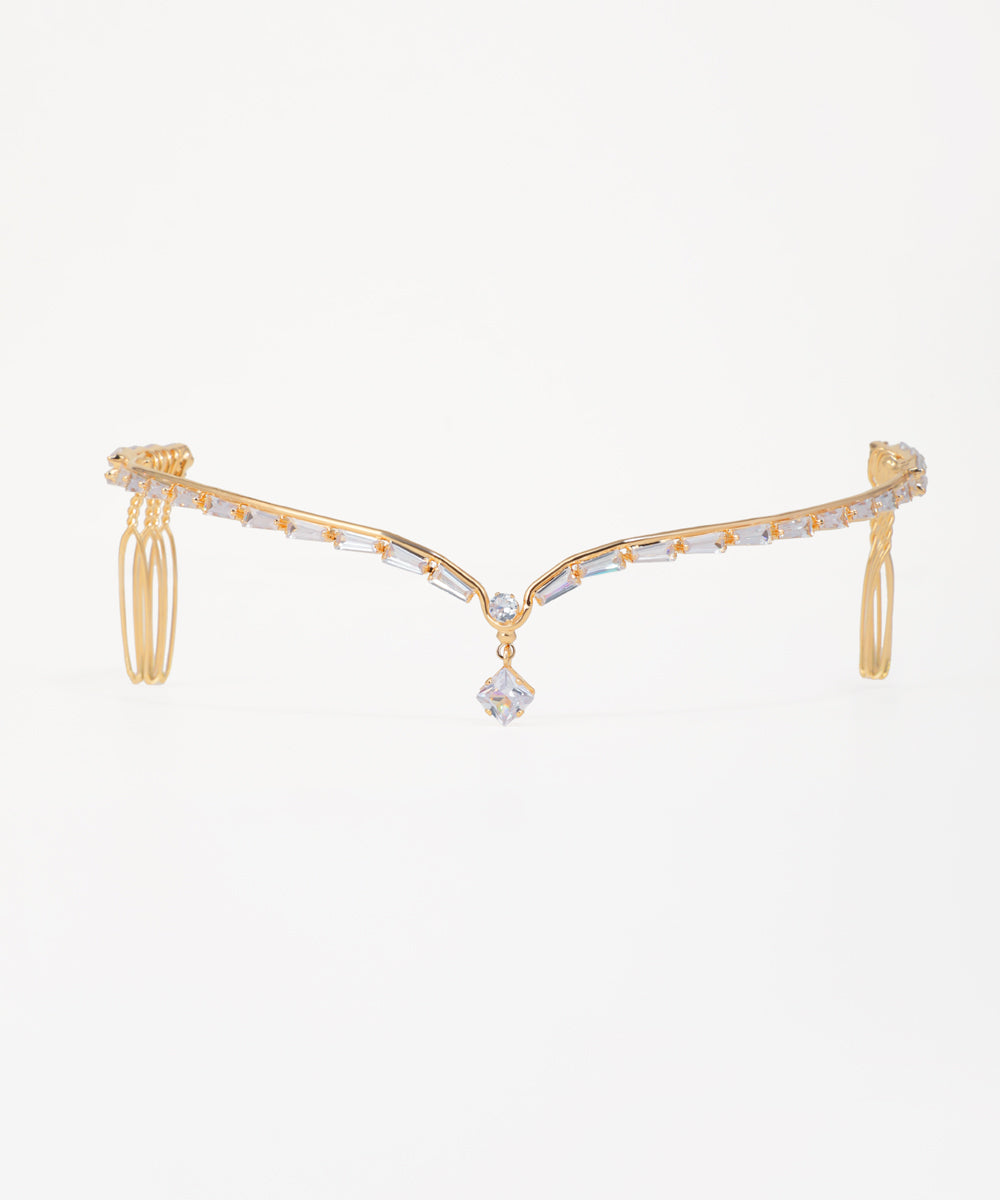Gold and diamond bracelet on a white background
