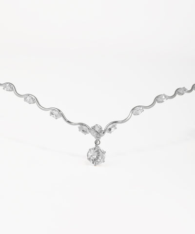 Crystal wedding tiara featuring cascading stone accents and silver finish