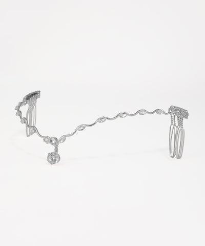 Bridal crown with shimmering stone drops and sculpted wave pattern