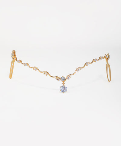 Crystal bridal tiara featuring a flowing wave design and hanging stone drops