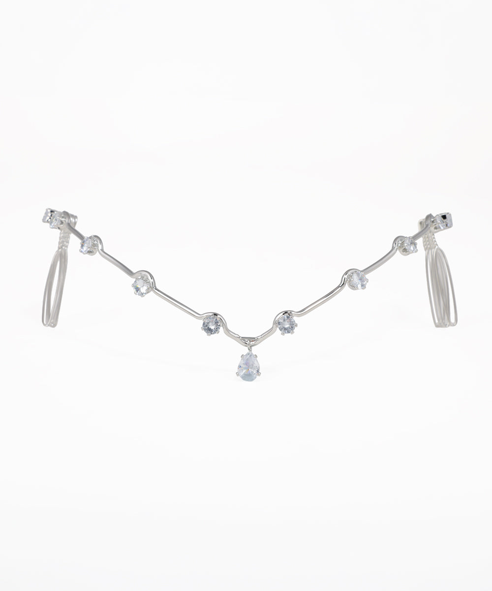 Crystal bridal tiara featuring a glamorous wave design and sparkling details
