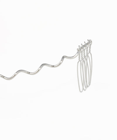 Crystal hair headpiece featuring a flowing wavy silhouette