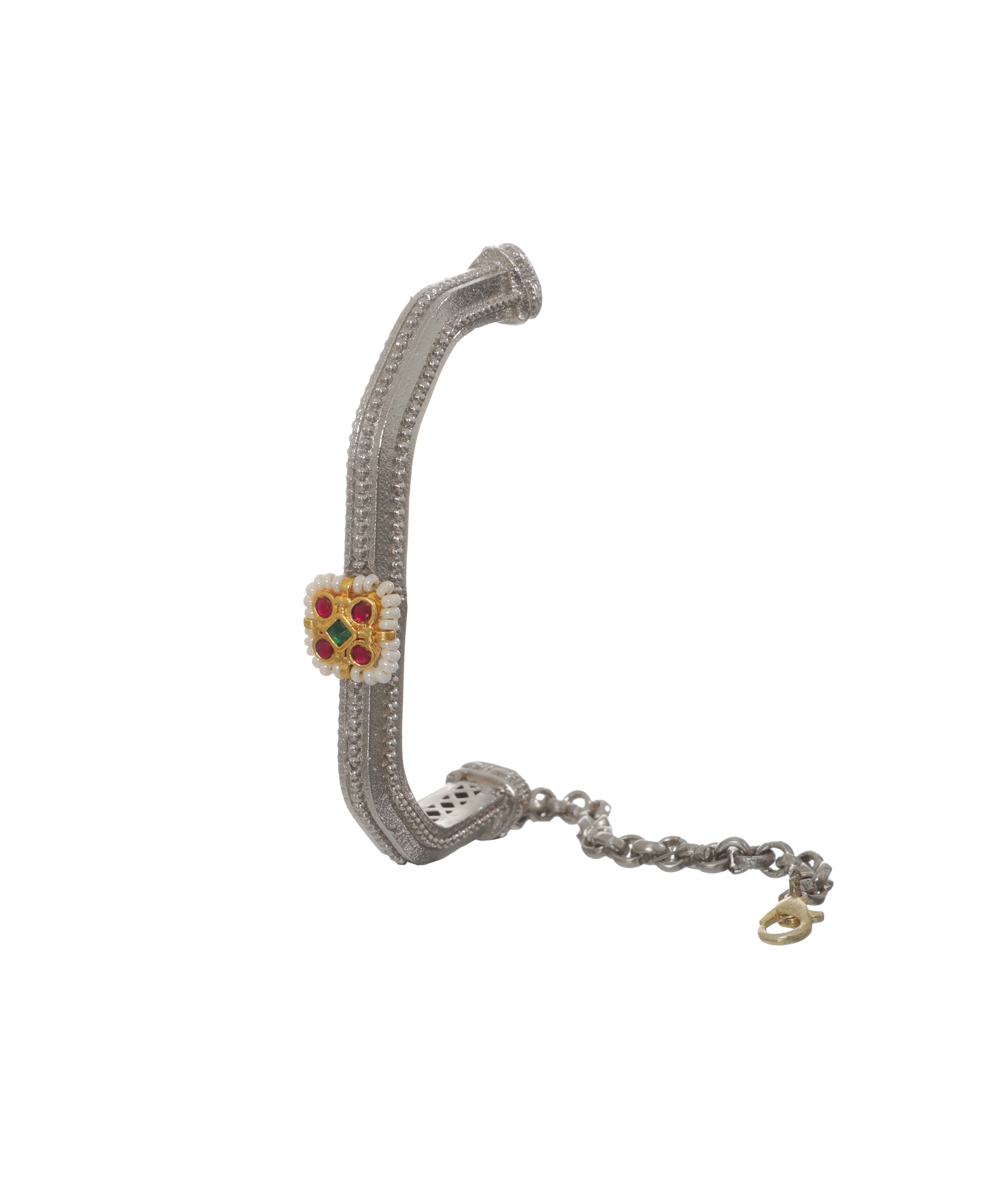 Oxidise cuff bracelet with textured silver-tone finish and central gold-tone element with red, green stones, and faux pearls.