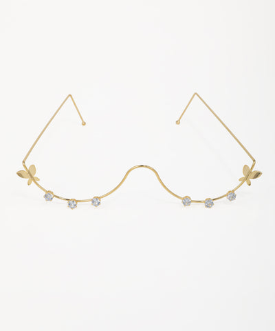 Gold-tone facelet with wavy wire, butterfly motifs, and six clear cubic zirconia stones.