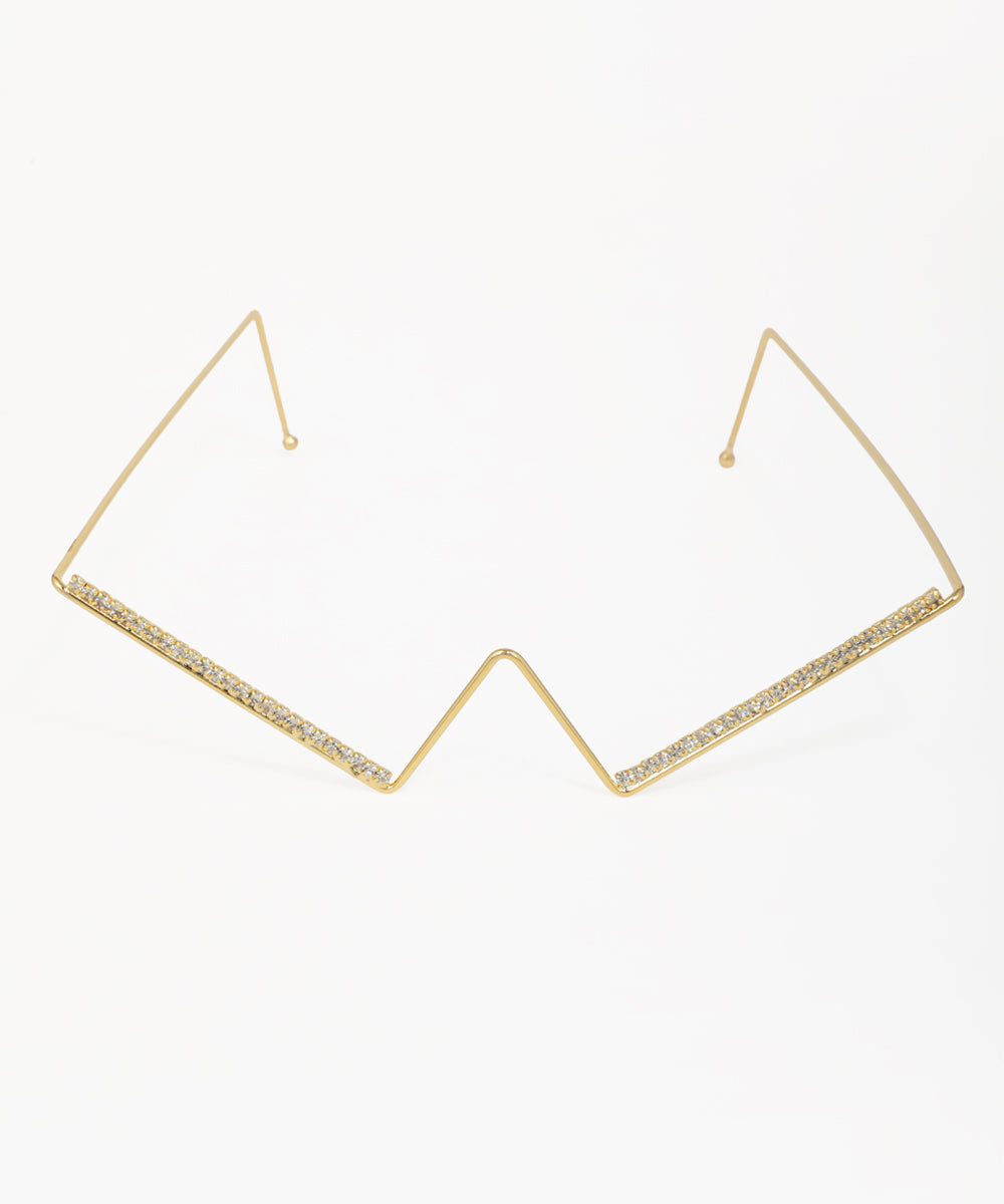 Gold-tone facelet with geometric zigzag design and clear crystal accents