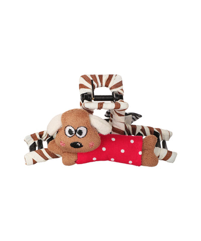 Brown and white striped claw clip with a plush dog character wearing a red polka-dot shirt.