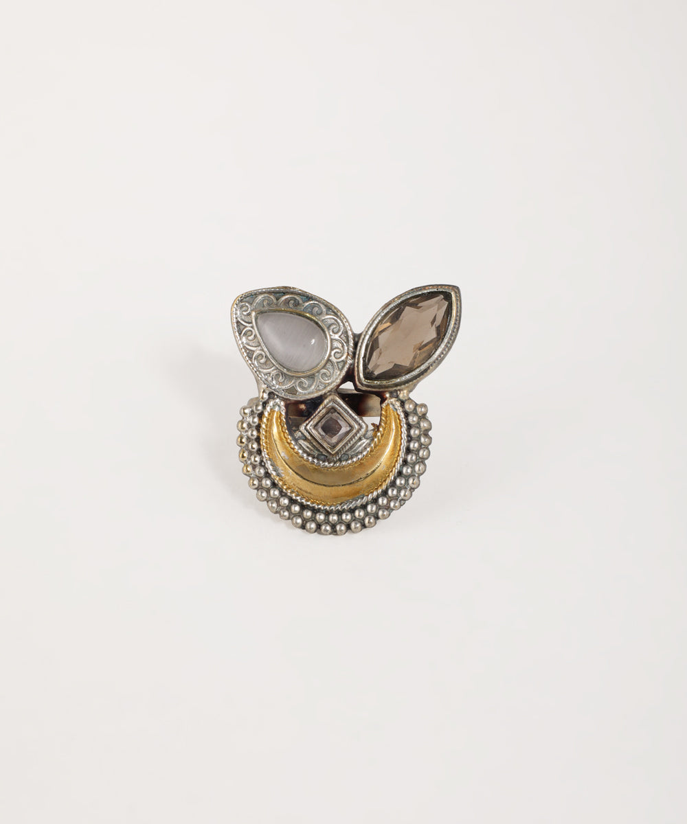 Oxidised silver-tone ring with gold-tone crescent, grey and brown glass stones, and beaded details
