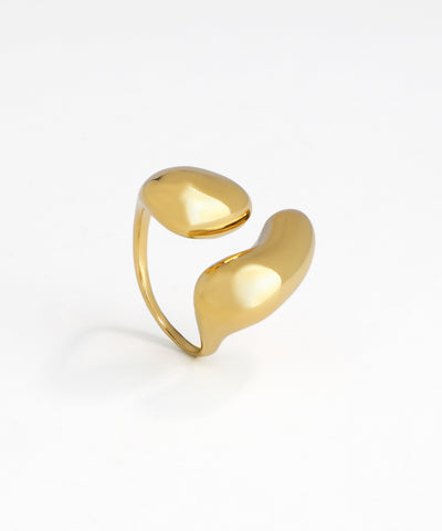 Gold-tone ring featuring two polished, abstract fluid forms on an open band.