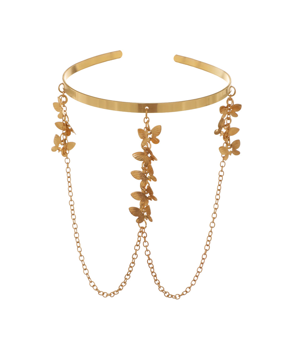 Gold-tone arm cuff with sculpted butterfly charms and draped chains.