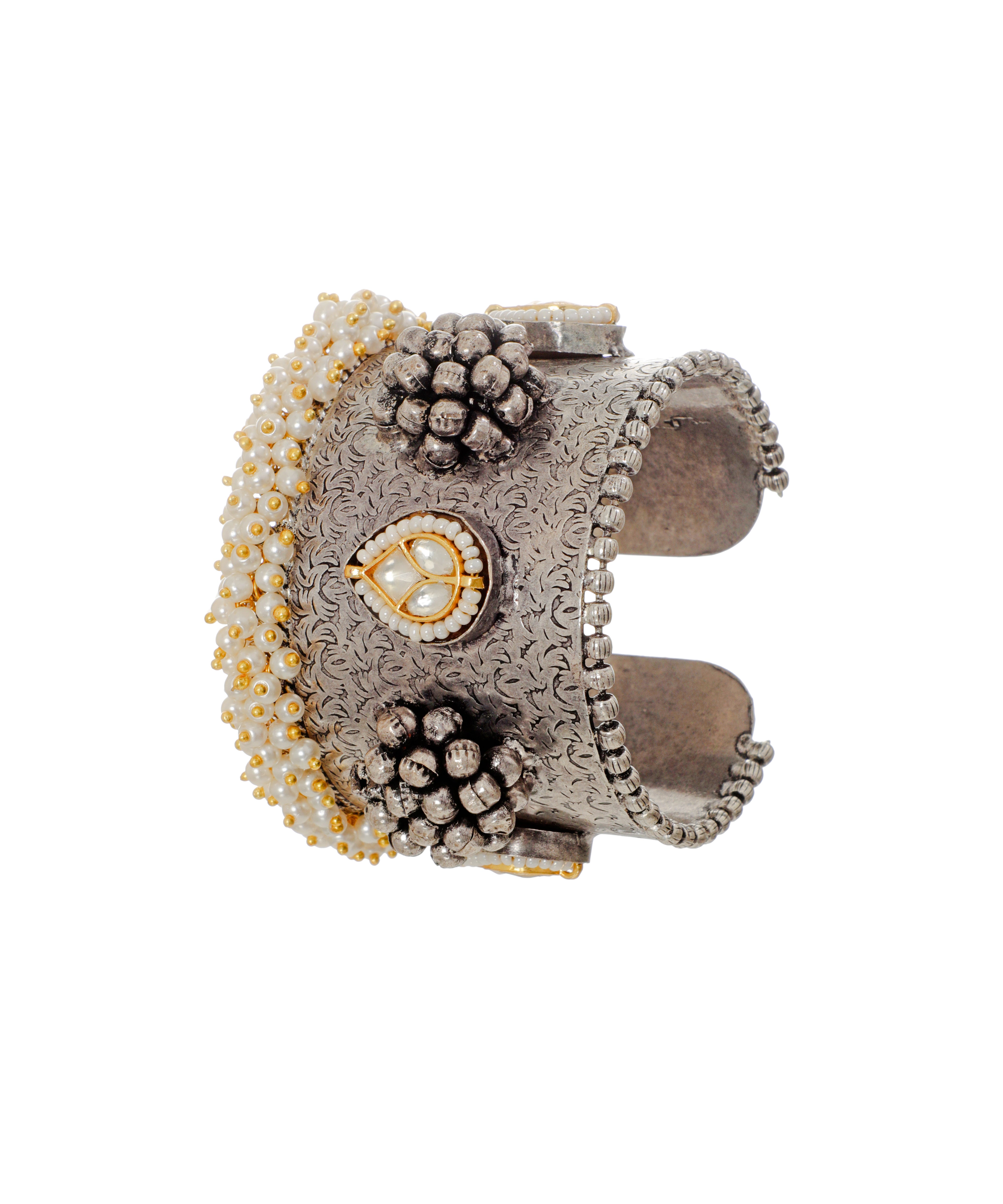 Oxidized silver-tone cuff bracelet with etched floral pattern, faux pearls, and central imitation polki design