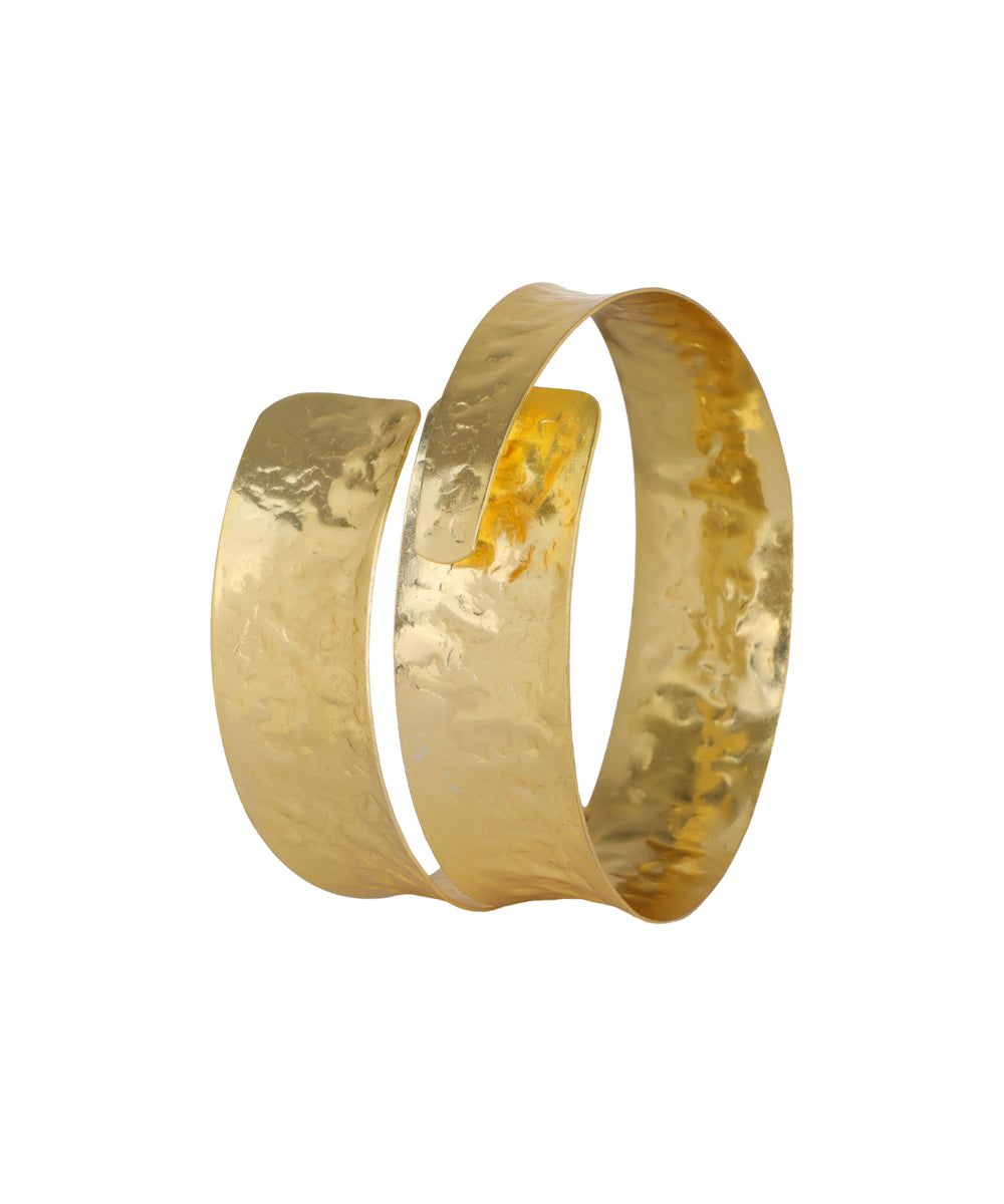 Gold-tone arm cuff with hammered texture and open-ended design