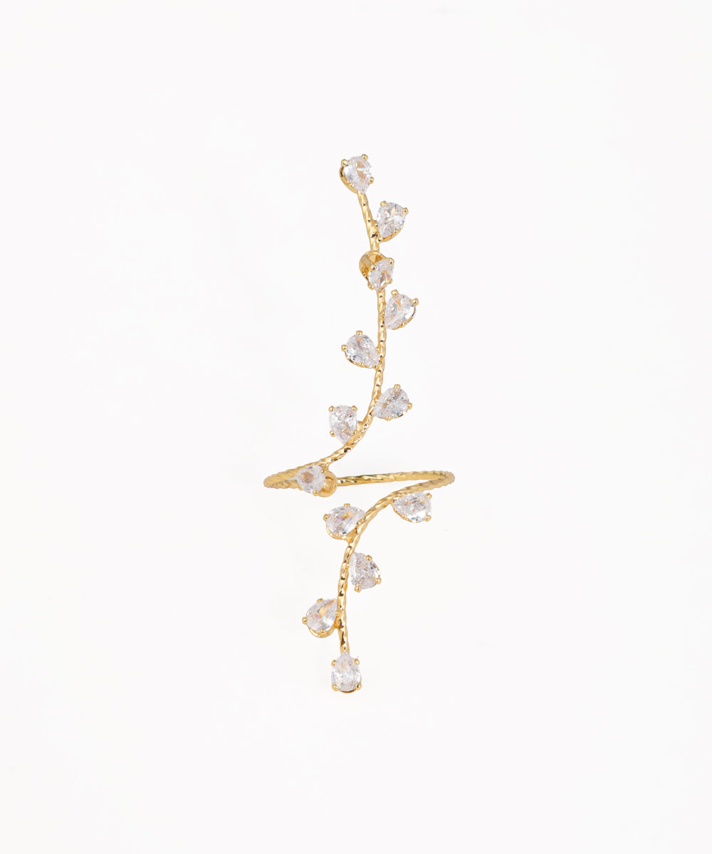 Gold-tone ring with clear teardrop stones on a textured vine design