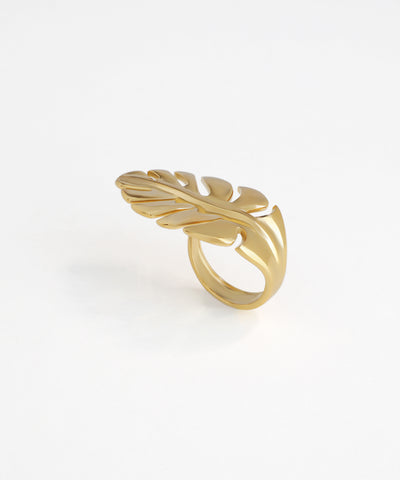 Gold-tone ring with a bold, polished Monstera leaf design and openwork detailing.