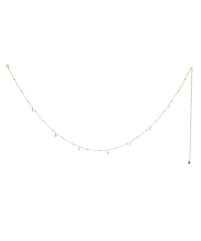 Gold-tone waist chain with small beads and clear cubic zirconia dangle accents