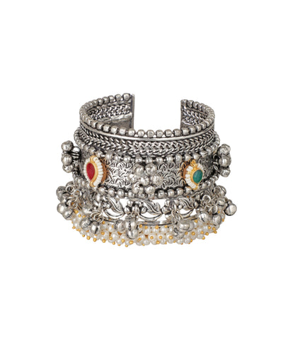 Oxidise cuff bracelet with floral engraving, red and green stones, and faux pearl drops