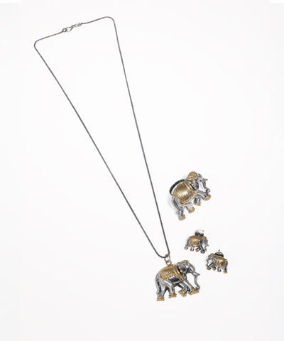Oxidized silver-tone necklace with elephant pendant and matching stud earrings, gold-tone accents
