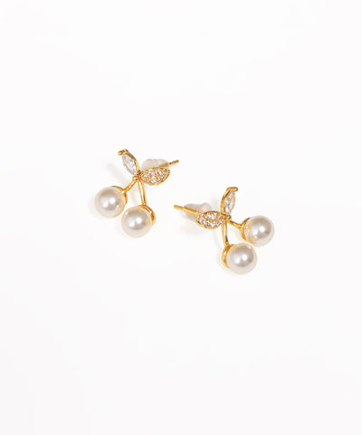 Gold-tone drop earrings with faux pearl berry cluster and clear CZ stones