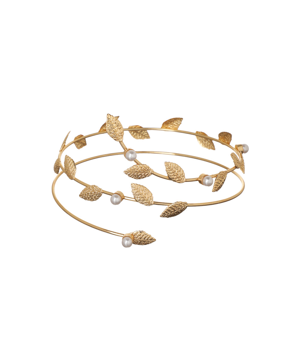 Gold-tone arm cuff with textured leaf design and small faux pearls