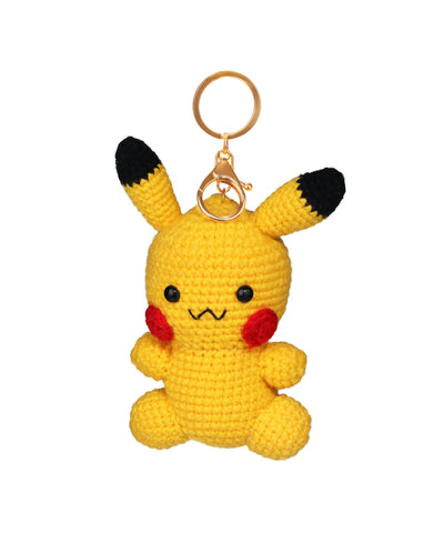 Yellow crochet keychain shaped like an animated character with black ears and gold-tone hardware.