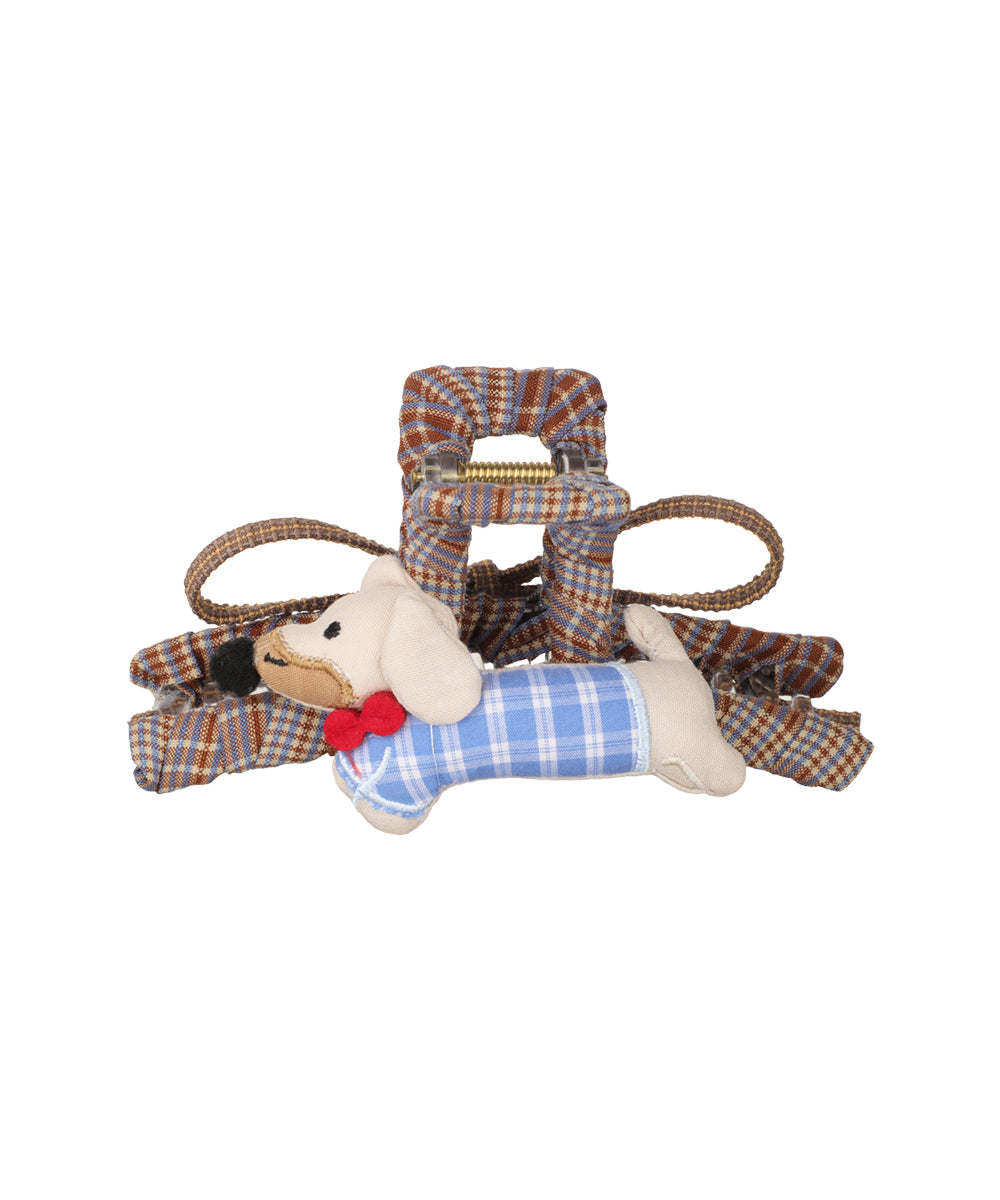 Fabric-covered claw clip with brown and blue plaid pattern and an attached plush dachshund dog.