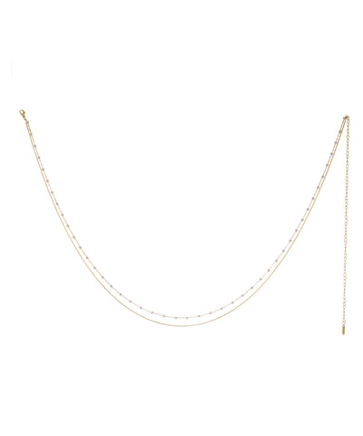 Gold-tone layered waist chain with small clear beaded embellishments