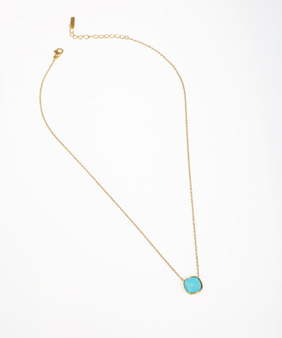 Gold-tone necklace with a square turquoise-tone glass crystal pendant and delicate chain.