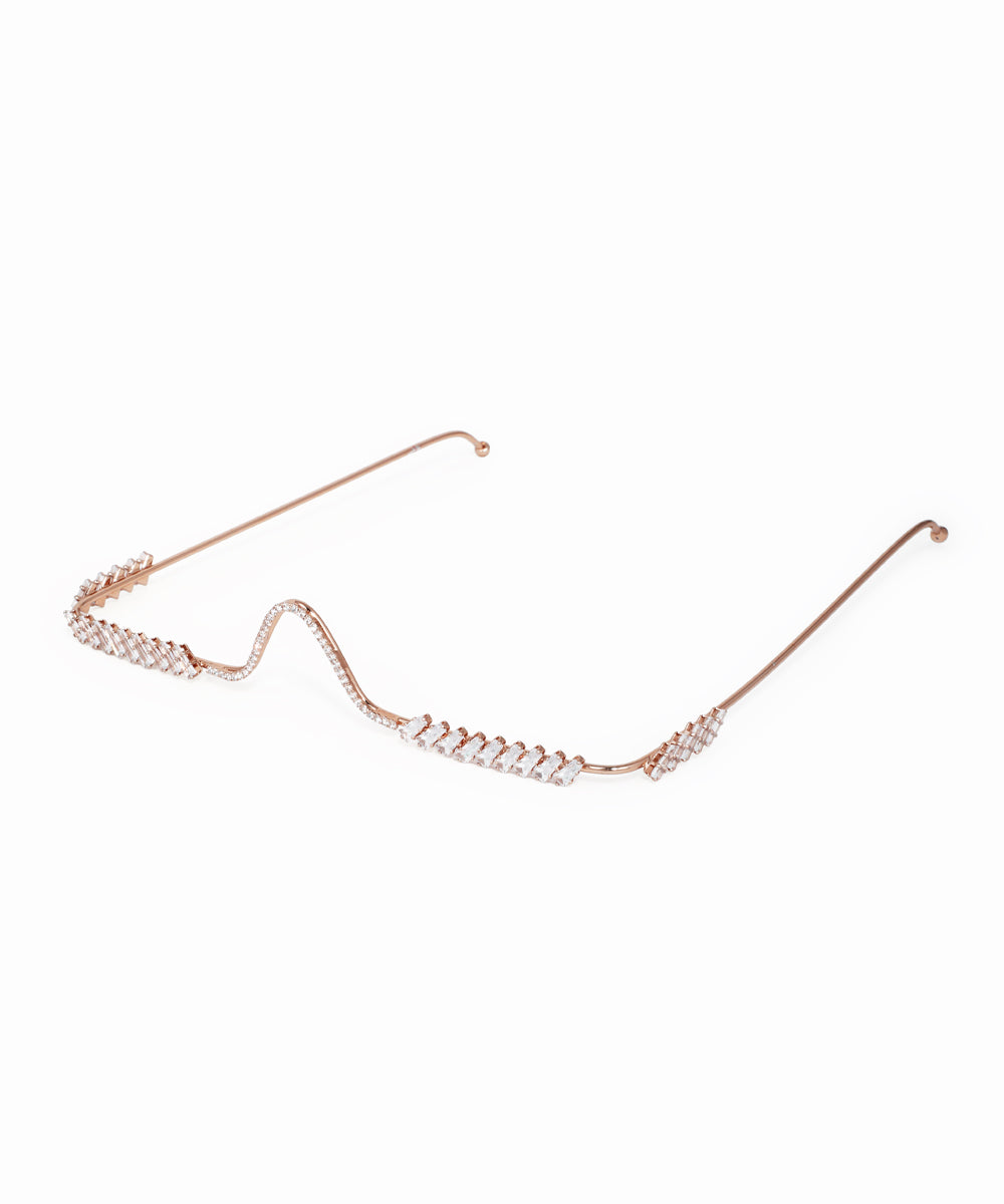 Rose-gold-tone facelet with wavy design and clear baguette and micro-set stones