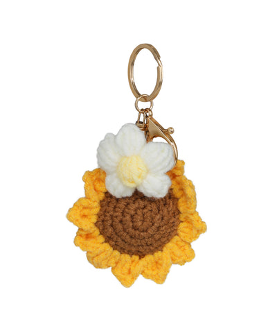 Gold-tone crochet keychain with sunflower and white flower design