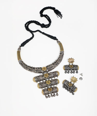 Oxidized silver-tone necklace set with brass-tone floral accents and matching drop earrings
