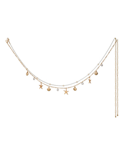 Gold-tone layered waist chain with white beads, starfish, seashell, and faux pearl charms