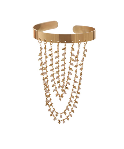 Gold-tone arm cuff with wide band and cascading chains featuring faux pearls and metallic beads