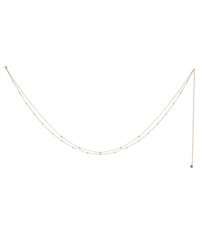 Gold-tone waist chain with two delicate layers and small metal beads