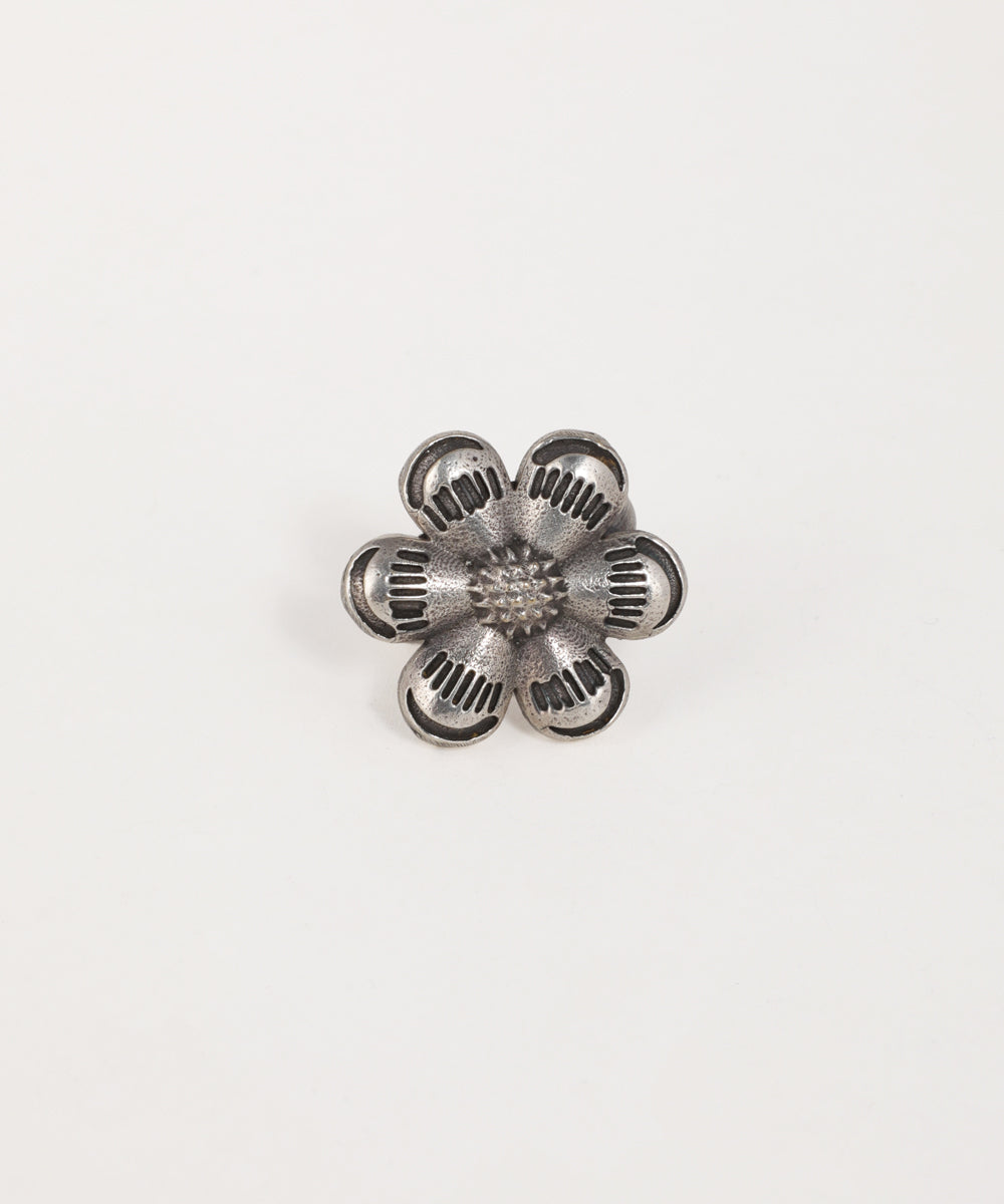 Oxidised silver-tone ring with detailed floral design and textured petals