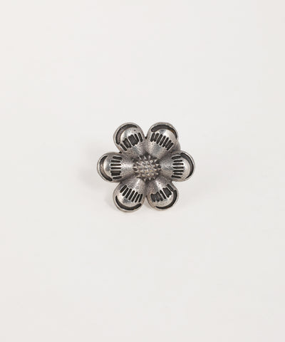 Oxidised silver-tone ring with detailed floral design and textured petals