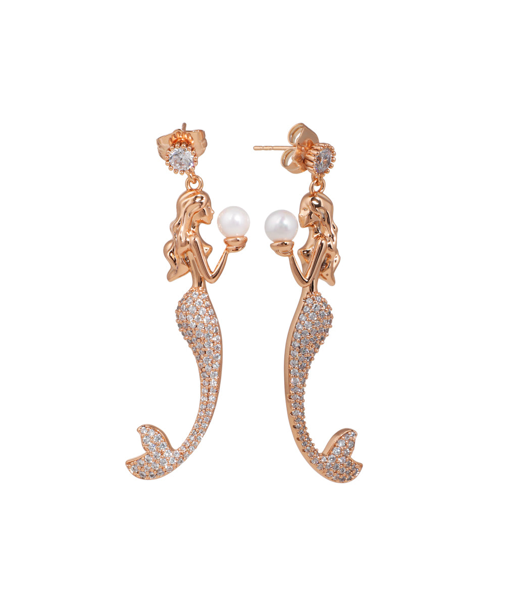 Rose-gold-tone drop earrings with mermaid design, faux pearls, and clear stones.