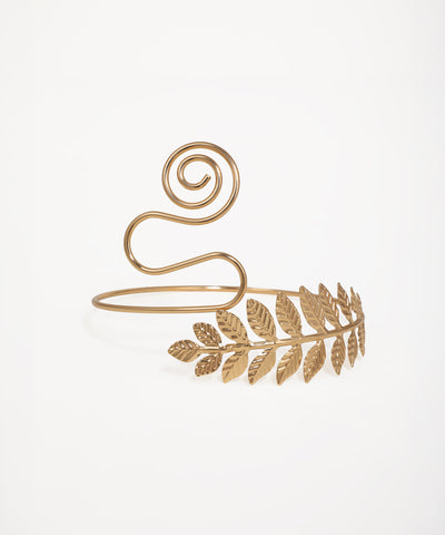Gold-tone arm cuff with textured laurel leaf design and decorative swirl