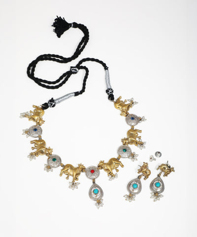 Dual-tone oxidise necklace set with gold-tone animal motifs, colorful glass crystals, and faux pearls