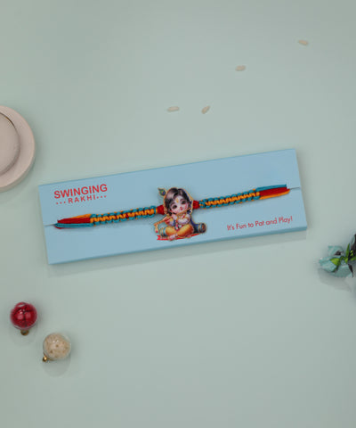 Multicolour braided thread Rakhi with cute Bala Krishna printed charm