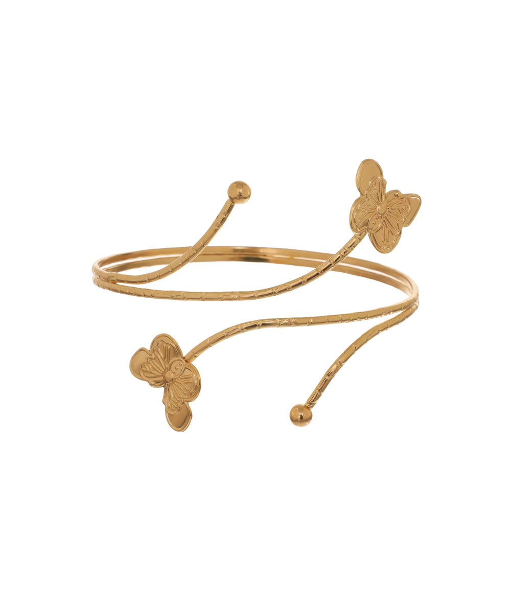 Gold-tone arm cuff with two textured wraparound bands and butterfly details