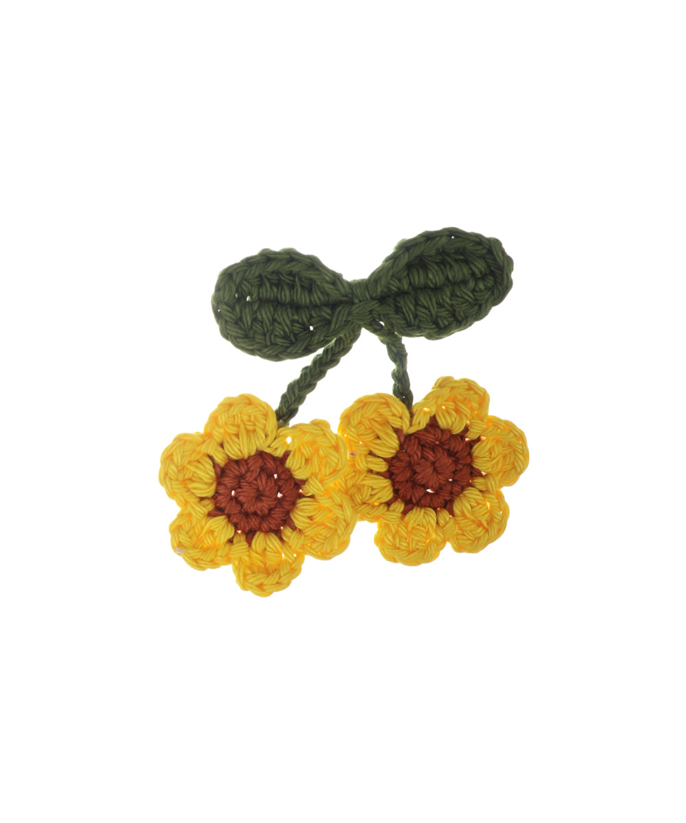 Yellow and brown sunflower crochet hair clip with green leaves