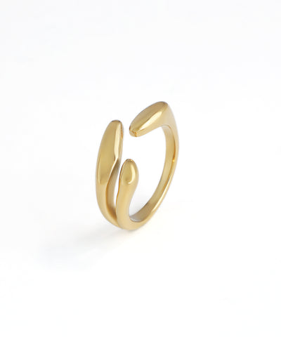 Gold-tone ring with a fluid, open band design
